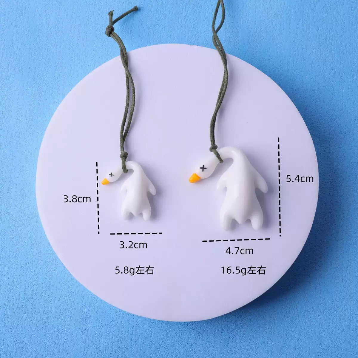 Color-changing roast duck pendant, it will change color when exposed to ultraviolet rays, spoof roast duck keychain, creative toy color-changing roast duck